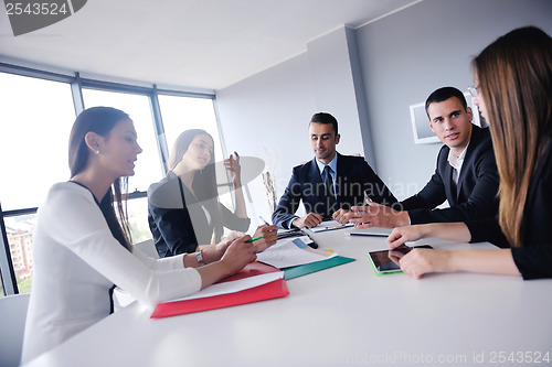 Image of business people group in a meeting at office