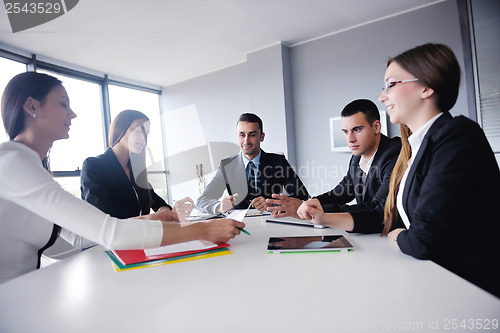 Image of business people group in a meeting at office