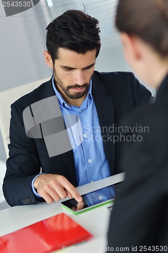 Image of business people group in a meeting at office