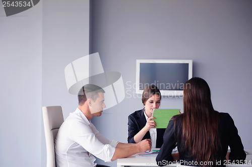 Image of business people group in a meeting at office