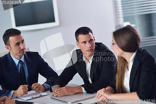 Image of business people group in a meeting at office