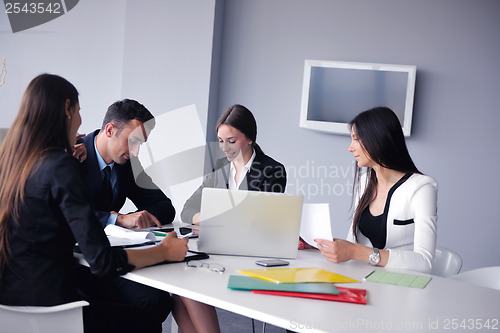Image of business people group in a meeting at office