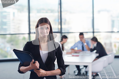 Image of business people group in a meeting at office