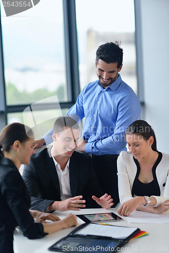 Image of business people group in a meeting at office