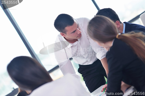 Image of business people group in a meeting at office