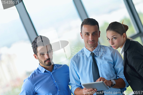 Image of business people group in a meeting at office