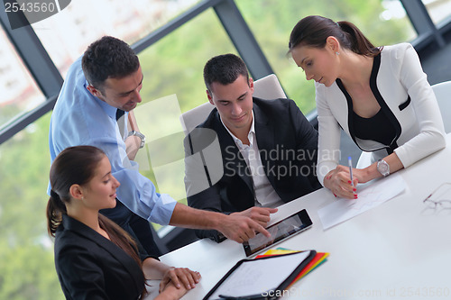 Image of business people group in a meeting at office