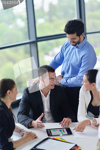 Image of business people group in a meeting at office