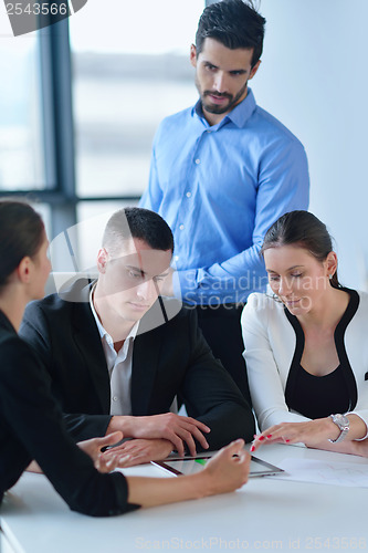 Image of business people group in a meeting at office