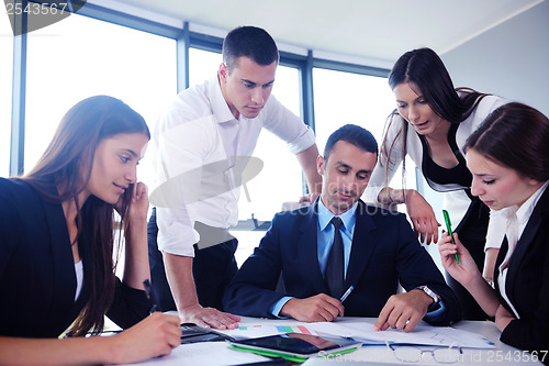 Image of business people group in a meeting at office