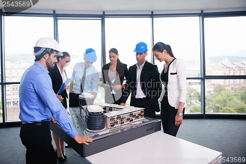 Image of business people and engineers on meeting