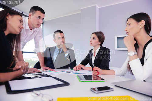 Image of business people group in a meeting at office