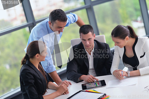 Image of business people group in a meeting at office