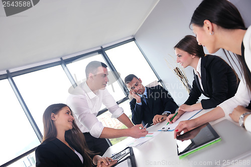 Image of business people group in a meeting at office