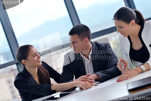 Image of business people group in a meeting at office