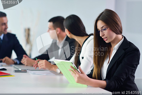 Image of business people group in a meeting at office