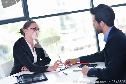 Image of business people group in a meeting at office