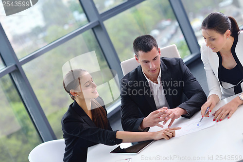 Image of business people group in a meeting at office