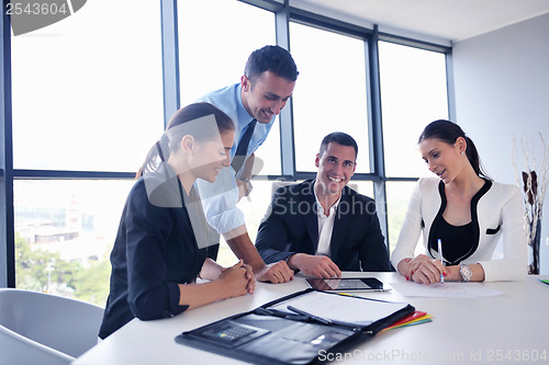 Image of business people group in a meeting at office