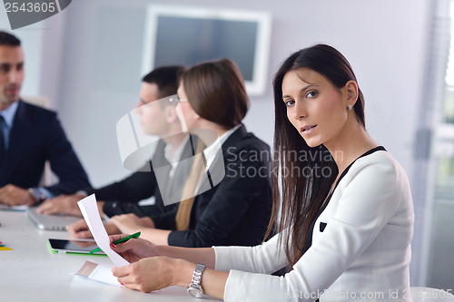 Image of business people group in a meeting at office