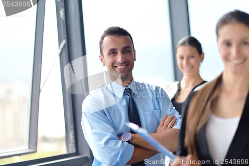 Image of business people group in a meeting at office