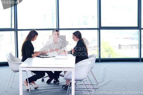 Image of business people group in a meeting at office