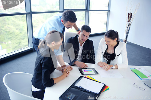 Image of business people group in a meeting at office
