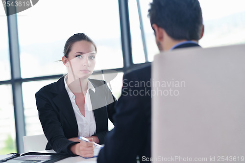 Image of business people group in a meeting at office