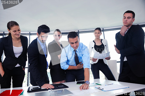 Image of business people group in a meeting at office