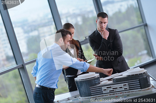 Image of business people and engineers on meeting