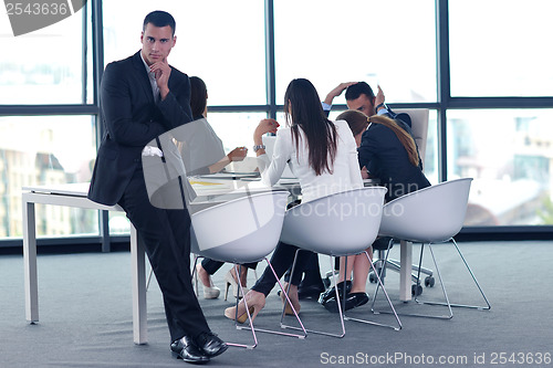 Image of business people group in a meeting at office