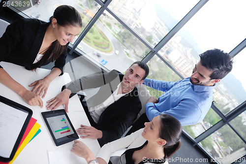 Image of business people group in a meeting at office