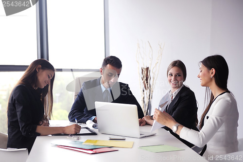 Image of business people group in a meeting at office