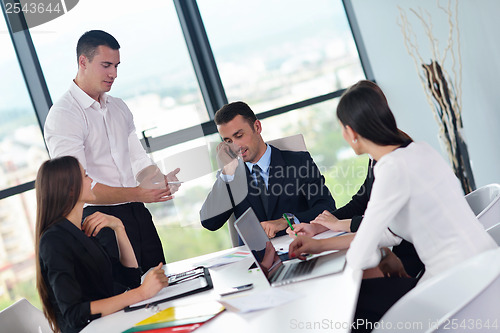 Image of business people group in a meeting at office