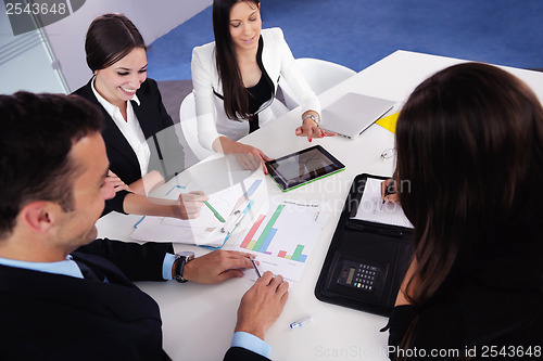 Image of business people group in a meeting at office