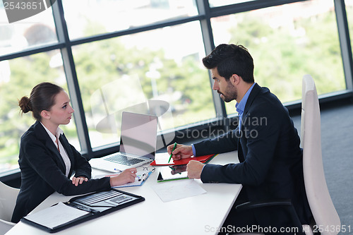 Image of business people group in a meeting at office