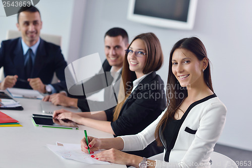 Image of business people group in a meeting at office