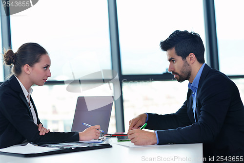 Image of business people group in a meeting at office