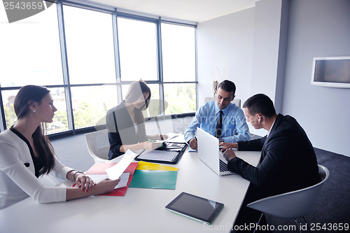 Image of business people group in a meeting at office