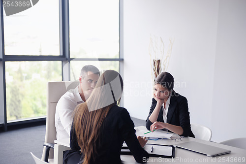 Image of business people group in a meeting at office