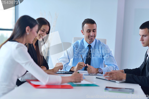 Image of business people group in a meeting at office