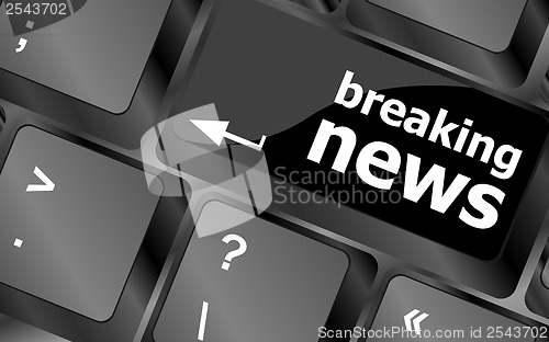 Image of breaking news button on computer keyboard pc key