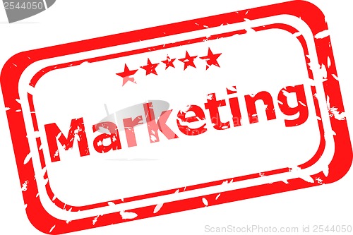 Image of marketing on red rubber stamp over a white background