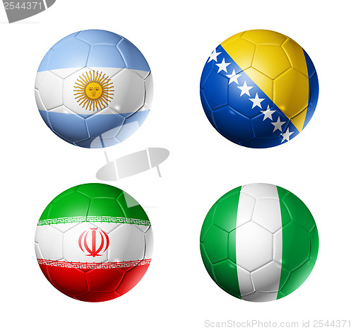 Image of Brazil world cup 2014 group F flags on soccer balls