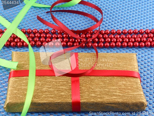 Image of White gift box with red ribbon bow