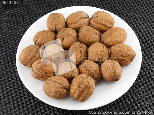 Image of Walnuts on a white plate