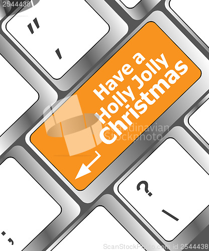 Image of Computer keyboard key with have a holly jolly christmas words