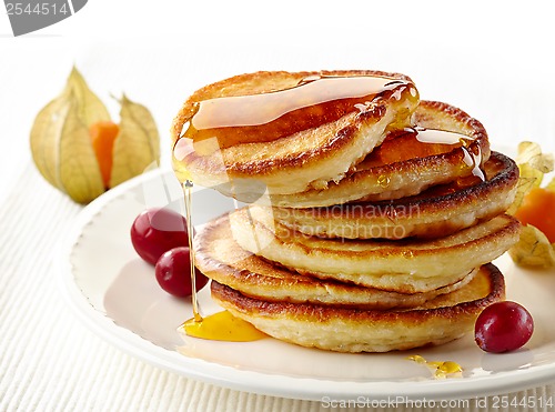 Image of stack of pancakes on white plate