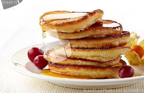 Image of stack of pancakes on white plate