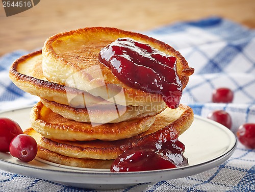 Image of stack of pancakes on white plate